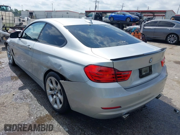 2014 BMW 4 Series 435i with VIN WBA3R1C52EK191381, listed as a IAAI auction lot 42257612 with 161,112 mi miles and . Bid and sale history available at DreamBid. Image 3.