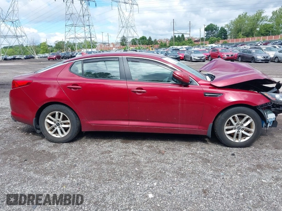 2011 Kia Optima LX z VIN KNAGM4A75B5168564, wystawiony jako IAAI lot #42301373 z przebiegiem Nie podano mil oraz . Historia ofert i sprzedaży dostępna na DreamBid. Obrazek 14.