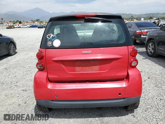 2009 Smart fortwo Pure z VIN WMEEJ31X89K291074, wystawiony jako Copart lot #56897635 z przebiegiem 145 504 mil mil oraz Czysty tytuł • Clean title. Historia ofert i sprzedaży dostępna na DreamBid. Obrazek 6.