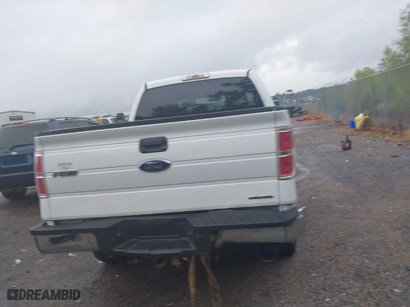 2014 Ford F-150 XL with VIN 1FTFW1EF5EFB70256, listed as a IAAI auction lot 39919684 with 329,427 mi miles. Bid and sale history available at carsss.com. Image 16.