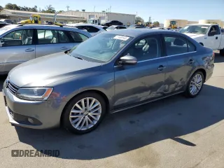 2011 Volkswagen Jetta SEL z VIN 3VWGX7AJXBM320093, wystawiony jako Copart lot #72485144 z przebiegiem 102 800 mil mil oraz Szkoda całkowita • Salvage title. Historia ofert i sprzedaży dostępna na DreamBid. Obrazek 1.