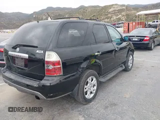 2004 Acura MDX Touring Pkg with VIN 2HNYD18644H556166, listed as a IAAI auction lot 42056719 with 210,418 mi miles. Bid and sale history available at carsss.com. Image 4.