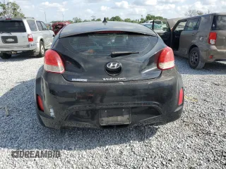 2013 Hyundai Veloster w/Gray Int z VIN KMHTC6AD1DU101406, wystawiony jako Copart lot #55087095 z przebiegiem 115 373 mil mil oraz Szkoda całkowita • Salvage title. Historia ofert i sprzedaży dostępna na DreamBid. Obrazek 6.