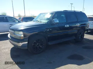 2004 Chevrolet Tahoe LS z VIN 1GNEC13V04R295023, wystawiony jako IAAI lot #42304325 z przebiegiem 170 153 mil mil oraz . Historia ofert i sprzedaży dostępna na DreamBid. Obrazek 2.