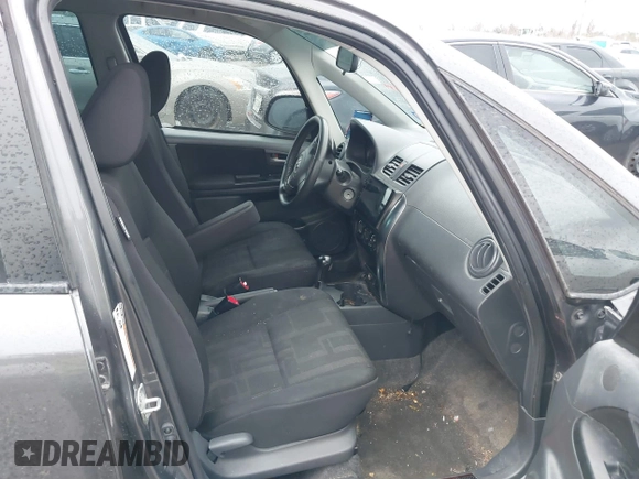 2012 Suzuki SX4 with VIN JS2YC5A55C6300349, listed as a IAAI auction lot 41472004 with 178,487 mi miles and . Bid and sale history available at DreamBid. Image 5.