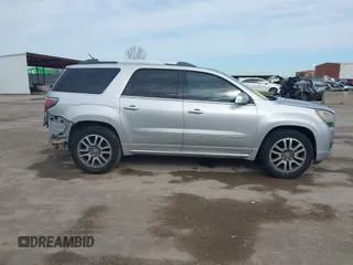 2014 GMC Acadia Denali z VIN 1GKKRTKD1EJ304413, wystawiony jako IAAI lot #41666574 z przebiegiem 115 717 mil mil oraz . Historia ofert i sprzedaży dostępna na DreamBid. Obrazek 13.
