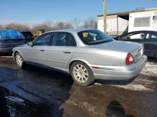 2004 Jaguar XJ with VIN SAJEA71C04SG04022, listed as a Copart auction lot 45875105 with 153,453 mi miles and Salvage Title. Bid and sale history available at carsss.com. Image 2.