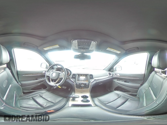 2015 Jeep Grand Cherokee Overland with VIN 1C4RJECG4FC808241, listed as a Copart auction lot 59699685 with 67,542 mi miles and Salvage title. Bid and sale history available at DreamBid. Image 16.