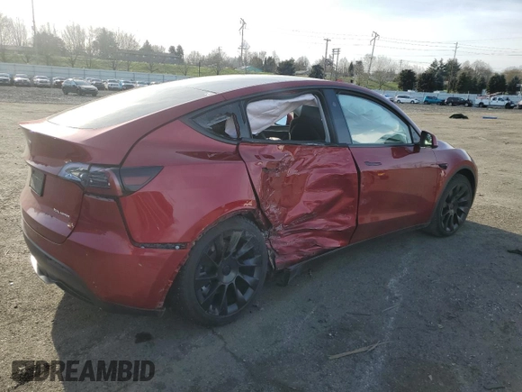 2024 Tesla Model Y Long Range with VIN 7SAYGAEEXRF056411, listed as a Copart auction lot 89218715 with Not Provided miles and Salvage Title. Bid and sale history available at DreamBid. Image 3.