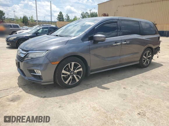 2018 Honda Odyssey Elite with VIN 5FNRL6H96JB015464, listed as a Copart auction lot 56911075 with 120,868 mi miles and Clean title. Bid and sale history available at DreamBid. Image 1.