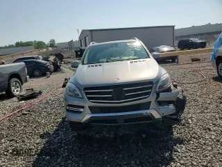 2014 Mercedes-Benz M 350 with VIN 4JGDA2EB4EA406865, listed as a Copart auction lot 61630045 with 142,616 mi miles and Salvage title. Bid and sale history available at DreamBid. Image 14.