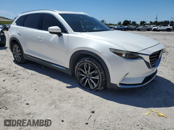 2016 Mazda CX-9 Grand Touring with VIN JM3TCADY9G0123193, listed as a Copart auction lot 50123825 with 65,588 mi miles and Salvage Title. Bid and sale history available at DreamBid. Image 4.