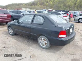 2000 Hyundai Accent z VIN KMHCF35G5YU017900, wystawiony jako IAAI lot #42063663 z przebiegiem 170 283 mil mil oraz . Historia ofert i sprzedaży dostępna na DreamBid. Obrazek 3.