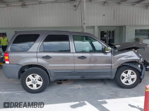 2005 Ford Escape Hybrid with VIN 1FMCU95HX5KD54412, listed as a IAAI auction lot 42115468 with 151,922 mi miles and . Bid and sale history available at DreamBid. Image 13.