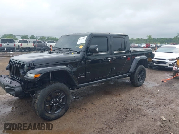 2023 Jeep Gladiator Overland with VIN 1C6JJTFM9PL593659, listed as a IAAI auction lot 42470253 with 34,374 mi miles and . Bid and sale history available at DreamBid. Image 21.
