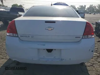 2014 Chevrolet Impala LT with VIN 2G1WB5E3XE1128402, listed as a Copart auction lot 63413525 with 101,161 mi miles and Salvage title. Bid and sale history available at DreamBid. Image 6.