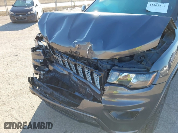 2017 Jeep Grand Cherokee Laredo with VIN 1C4RJFAG7HC769642, listed as a IAAI auction lot 41367874 with 128,095 mi miles. Bid and sale history available at carsss.com. Image 6.