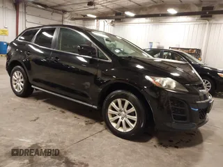 2011 Mazda CX-7 i Sport z VIN JM3ER2B54B0355683, wystawiony jako IAAI lot #42153260 z przebiegiem 238 786 mil mil oraz . Historia ofert i sprzedaży dostępna na DreamBid. Obrazek 1.