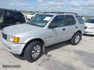 1998 Honda Passport LX with VIN 4S6CM58WXW4414530, listed as a IAAI auction lot 42060405 with 175,406 mi miles. Bid and sale history available at carsss.com. Image 2.