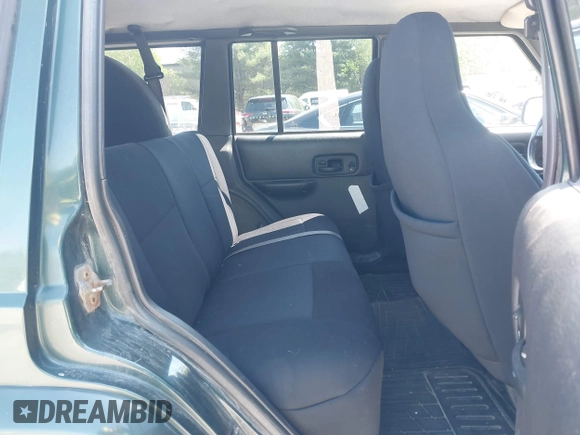 2000 Jeep Cherokee z VIN 1J4FF48S2YL253251, wystawiony jako IAAI lot #42243268 z przebiegiem 154 136 mil mil oraz . Historia ofert i sprzedaży dostępna na DreamBid. Obrazek 8.