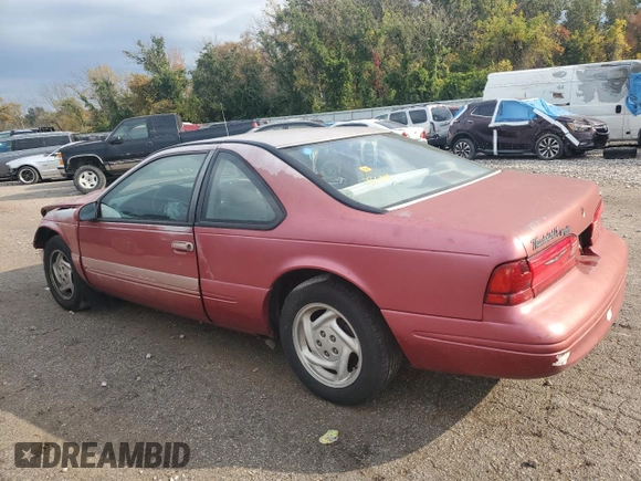 1996 Ford Thunderbird LX z VIN 1FALP62W7TH135632, wystawiony jako Copart lot #77134024 z przebiegiem 128 931 mil mil oraz Szkoda całkowita • Salvage title. Historia ofert i sprzedaży dostępna na DreamBid. Obrazek 2.