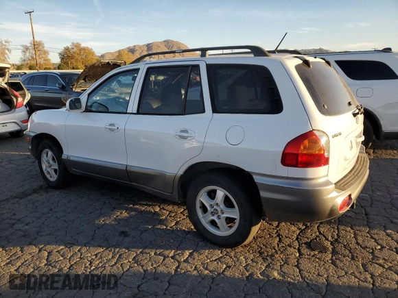 2004 Hyundai Santa Fe GLS with VIN KM8SC13D34U759899, listed as a Copart auction lot 85283734 with 85,297 mi miles and Salvage Title. Bid and sale history available at DreamBid. Image 2.