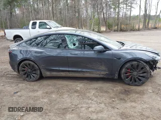 2021 Tesla Model 3 Performance with VIN 5YJ3E1EC1MF925515, listed as a IAAI auction lot 41721548 with 36,478 mi miles and . Bid and sale history available at carsss.com. Image 13.