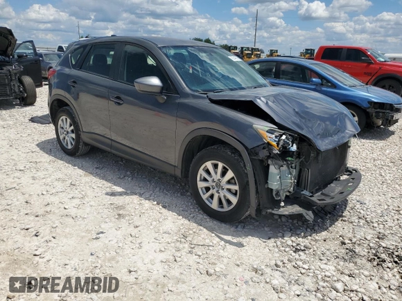 2014 Mazda CX-5 Sport z VIN JM3KE2BE8E0421316, wystawiony jako Copart lot #56548005 z przebiegiem 203 096 mil mil oraz Szkoda całkowita • Salvage title. Historia ofert i sprzedaży dostępna na DreamBid. Obrazek 4.