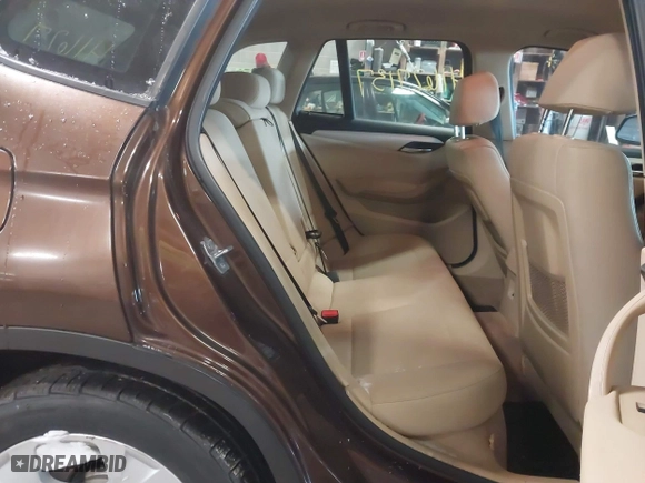 2013 BMW X1 28i with VIN WBAVM1C59DVW42455, listed as a IAAI auction lot 41627137 with 170,120 mi miles. Bid and sale history available at carsss.com. Image 8.