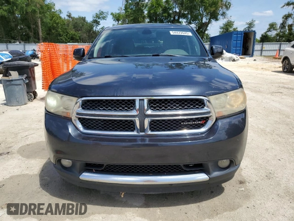 2013 Dodge Durango Crew with VIN 1C4SDHDT3DC679153, listed as a Copart auction lot 54472645 with 167,068 mi miles and Salvage Title. Bid and sale history available at DreamBid. Image 5.