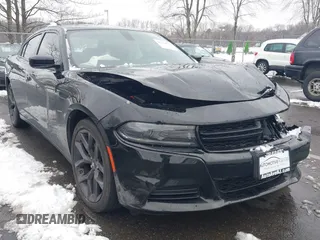 2022 Dodge Charger SXT with VIN 2C3CDXBG0NH157720, listed as a IAAI auction lot 41559731 with 21,062 mi miles and . Bid and sale history available at carsss.com. Image 1.