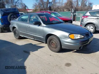 2004 Pontiac Grand Am SE with VIN 1G2NE52F54M560234, listed as a IAAI auction lot 41716361 with 256,571 mi miles. Bid and sale history available at carsss.com. Image 1.