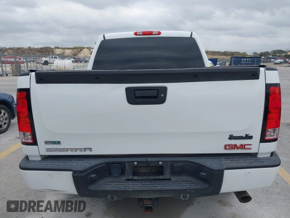 2011 GMC Sierra 1500 Denali z VIN 3GTP2XE25BG404518, wystawiony jako IAAI lot #41504566 z przebiegiem 187 926 mil mil oraz . Historia ofert i sprzedaży dostępna na DreamBid. Obrazek 16.