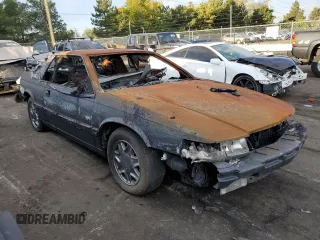 2001 Cadillac Eldorado ESC z VIN 1G6EL12Y81B110048, wystawiony jako Copart lot #69995914 z przebiegiem Nie podano mil oraz Nie do naprawy. Historia ofert i sprzedaży dostępna na DreamBid. Obrazek 4.