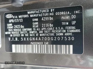 2013 Kia Optima EX z VIN 5XXGN4A70DG207530, wystawiony jako Copart lot #58270795 z przebiegiem 188 998 mil mil oraz Szkoda całkowita • Salvage title. Historia ofert i sprzedaży dostępna na DreamBid. Obrazek 12.