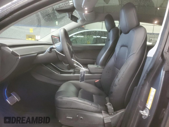 2021 Tesla Model Y Long Range with VIN 5YJYGDEE0MF076660, listed as a Copart auction lot 55957365 with 80,432 mi miles and Salvage Title. Bid and sale history available at DreamBid. Image 7.