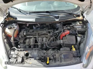 2018 Ford Fiesta SE z VIN 3FADP4BJ4JM133102, wystawiony jako Copart lot #54224805 z przebiegiem 124 307 mil mil oraz Szkoda całkowita • Salvage title. Historia ofert i sprzedaży dostępna na DreamBid. Obrazek 11.