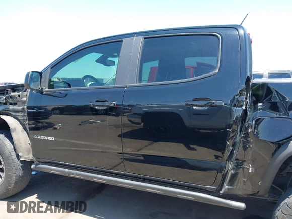 2018 Chevrolet Colorado 4WD ZR2 z VIN 1GCGTEEN5J1259764, wystawiony jako IAAI lot #42474810 z przebiegiem 111 187 mil mil oraz . Historia ofert i sprzedaży dostępna na DreamBid. Obrazek 15.