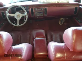 1993 Cadillac Fleetwood z VIN 1G6DW5270PR704750, wystawiony jako Copart lot #88751055 z przebiegiem Nie podano mil oraz Szkody całkowita. Historia ofert i sprzedaży dostępna na DreamBid. Obrazek 8.