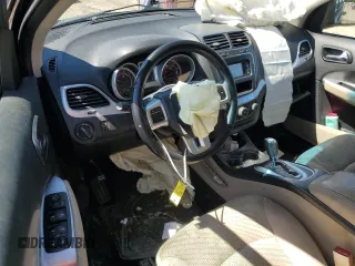 2013 Dodge Journey SE with VIN 3C4PDCAB5DT729415, listed as a Copart auction lot 55851915 with 128,782 mi miles and Salvage title. Bid and sale history available at DreamBid. Image 8.
