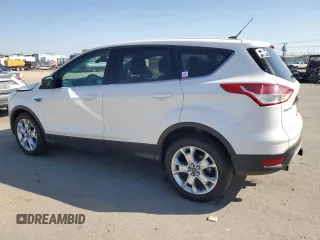 2013 Ford Escape SEL with VIN 1FMCU9H91DUC35459, listed as a Copart auction lot 55277545 with 130,081 mi miles and Salvage Title. Bid and sale history available at DreamBid. Image 2.