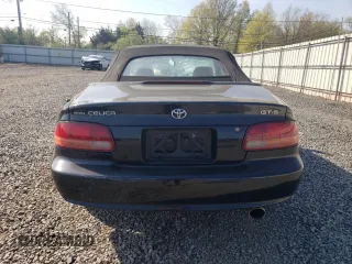 1997 Toyota Celica GT z VIN JT5FG02T2V0044842, wystawiony jako Copart lot #54335965 z przebiegiem 203 152 mil mil oraz Szkoda całkowita • Salvage title. Historia ofert i sprzedaży dostępna na DreamBid. Obrazek 6.