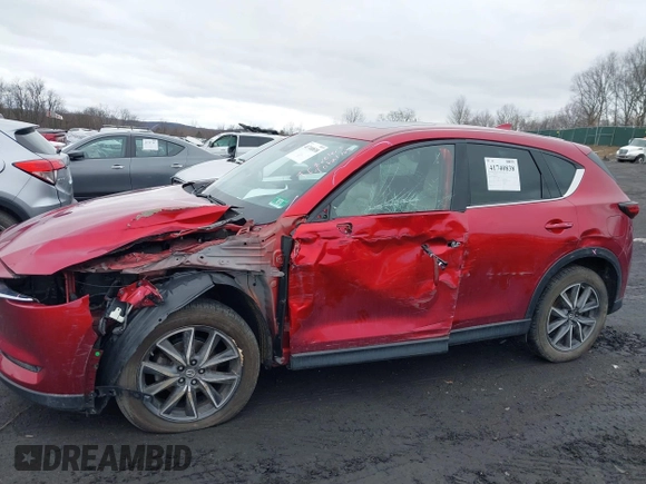 2018 Mazda CX-5 Grand Touring with VIN JM3KFBDM0J0427753, listed as a IAAI auction lot 41740838 with 69,683 mi miles and . Bid and sale history available at DreamBid. Image 6.