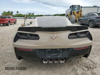 2015 Chevrolet Corvette Z51 1LT z VIN 1G1YH2D74F5117020, wystawiony jako Copart lot #52010015 z przebiegiem Nie podano mil oraz Szkoda całkowita • Salvage title. Historia ofert i sprzedaży dostępna na DreamBid. Obrazek 6.