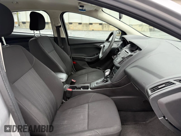 2017 Ford Focus SE with VIN 1FADP3F28HL28437, listed as a Copart auction lot 57904285 with 72,966 mi miles and Clean title. Bid and sale history available at DreamBid. Image 5.