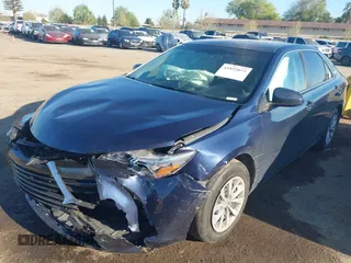 2017 Toyota Camry XLE with VIN 4T1BF1FK9HU737994, listed as a IAAI auction lot 41852075 with 114,923 mi miles. Bid and sale history available at carsss.com. Image 2.