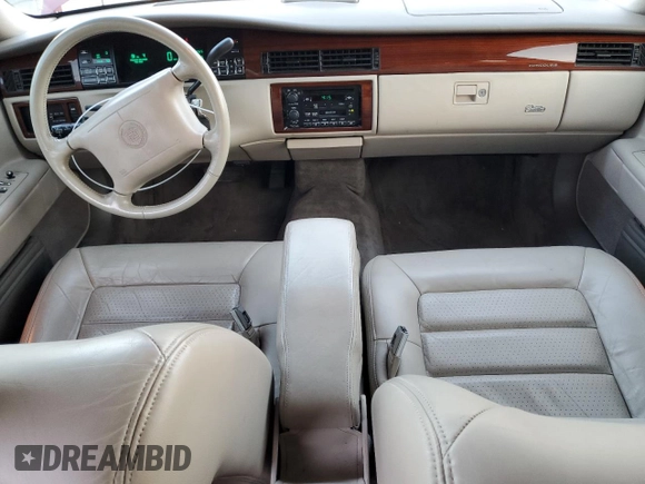 1994 Cadillac Concours z VIN 1G6KF52Y6RU201076, wystawiony jako Copart lot #44333975 z przebiegiem 70 265 mil mil oraz Szkody całkowita. Historia ofert i sprzedaży dostępna na DreamBid. Obrazek 8.