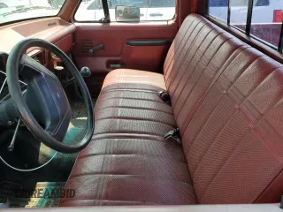 1987 Ford F-150 with VIN 1FTDF15Y9HNA25725, listed as a Copart auction lot 67257004 with 71,808 mi miles and Salvage Title. Bid and sale history available at carsss.com. Image 7.