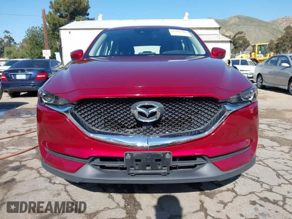 2019 Mazda CX-5 Sport with VIN JM3KFABM0K1633065, listed as a IAAI auction lot 41968786 with 90,407 mi miles and . Bid and sale history available at DreamBid. Image 12.
