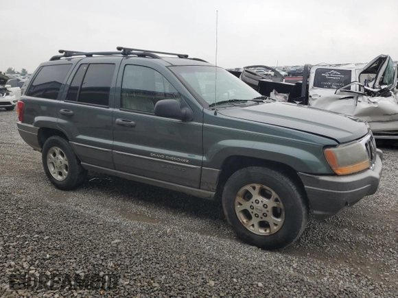 2002 Jeep Grand Cherokee z VIN 1J4GX38S72C152046, wystawiony jako Copart lot #57963095 z przebiegiem 204 576 mil mil oraz Szkoda całkowita • Salvage title. Historia ofert i sprzedaży dostępna na DreamBid. Obrazek 4.